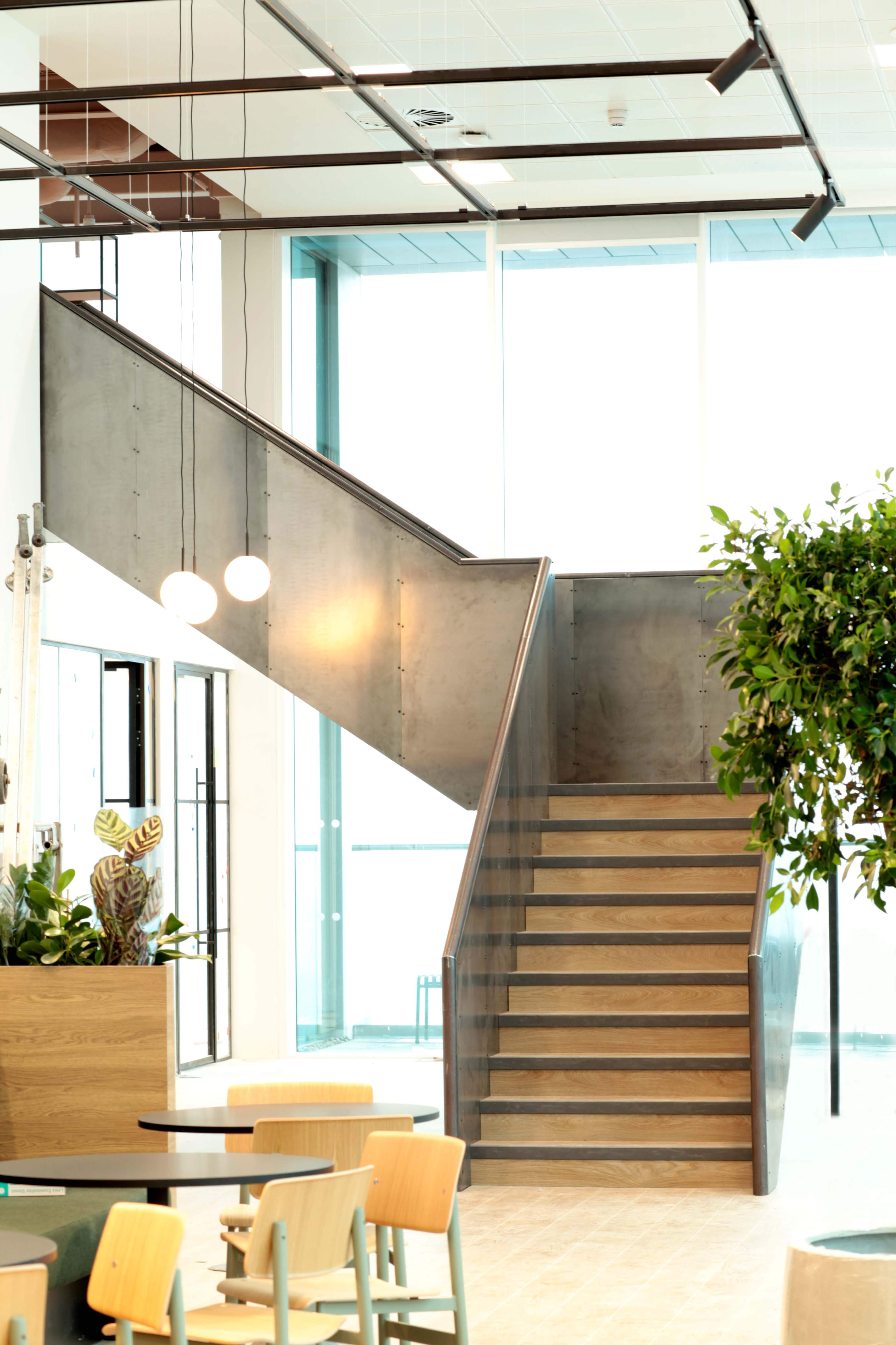 Steel staircase with metal balustrade and solid steel balustrade